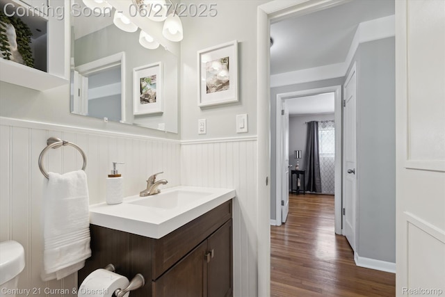 11769 Eileen, Redford, MI 48239 - half bathroom featuring wainscoting, vanity, wood finished floors, and a chandelier