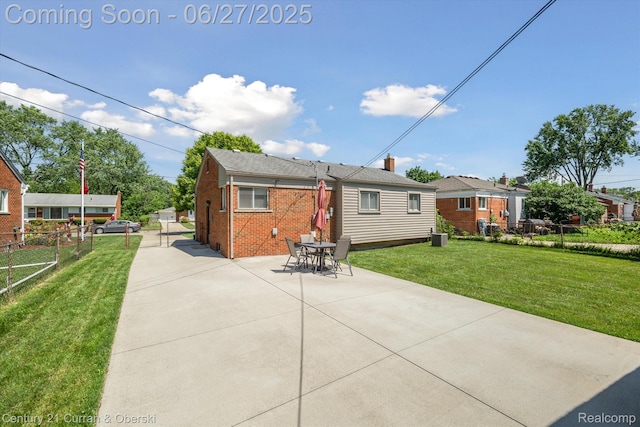 11769 Eileen, Redford, MI 48239 - rear view of house with brick siding and a patio