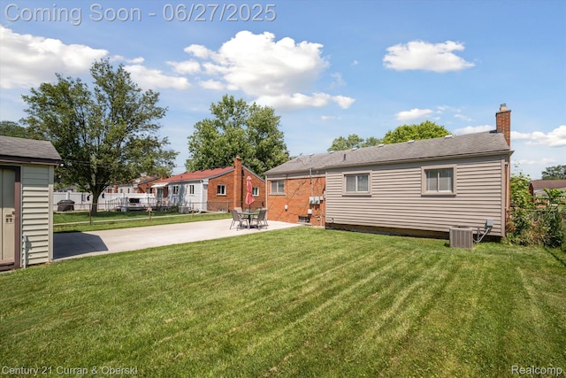 11769 Eileen, Redford, MI 48239 - back of house featuring a patio and a chimney