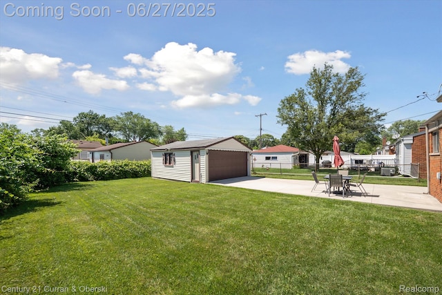 11769 Eileen, Redford, MI 48239 - view of yard with an outbuilding, a detached garage, and a patio