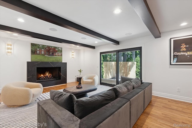 4438 Stony River Dr, Bloomfield Hills, MI 48301 - living room featuring a premium fireplace, beam ceiling, light wood-type flooring, and recessed lighting