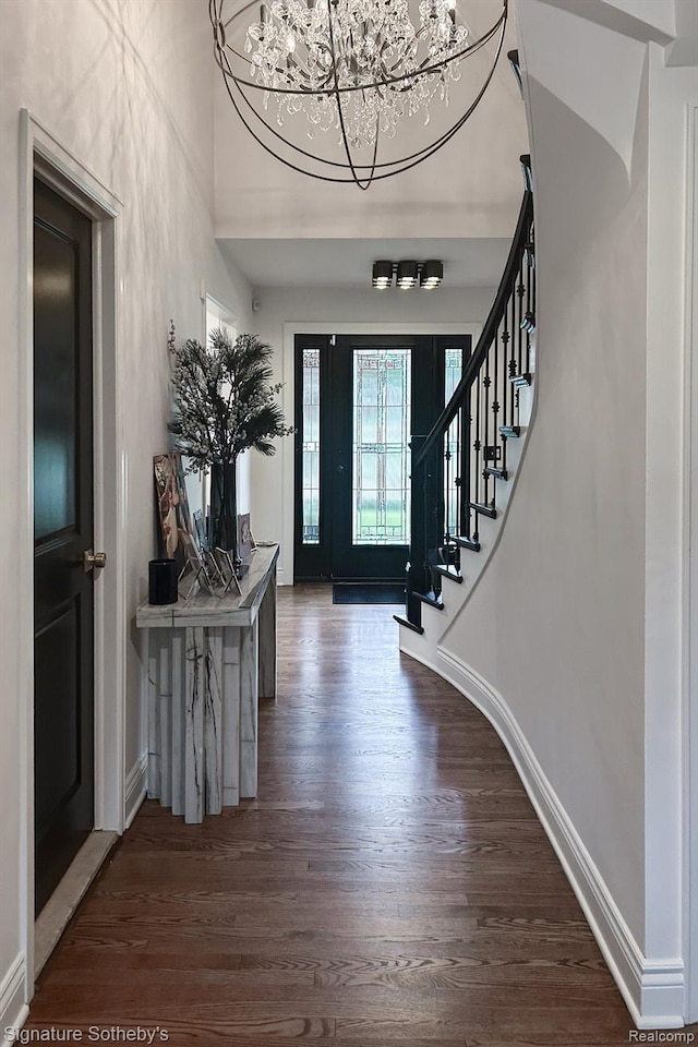 4438 Stony River Dr, Bloomfield Hills, MI 48301 - foyer featuring wood finished floors, a chandelier, and stairs