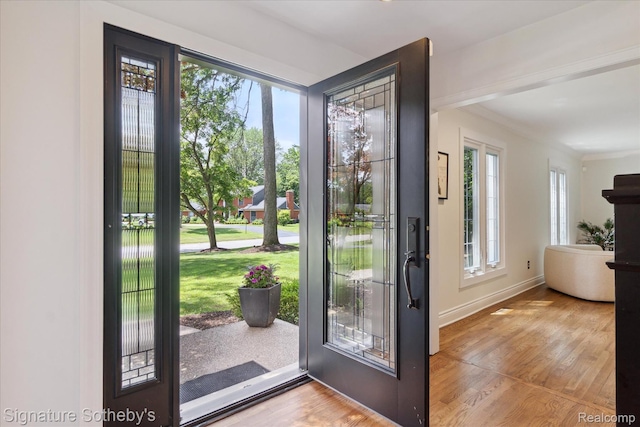 4438 Stony River Dr, Bloomfield Hills, MI 48301 - entryway with wood finished floors and ornamental molding