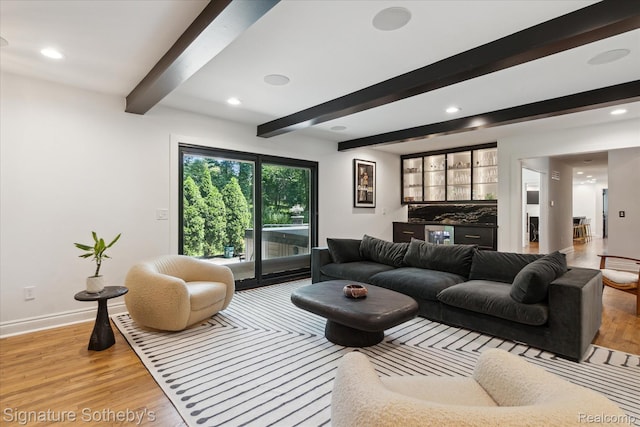 4438 Stony River Dr, Bloomfield Hills, MI 48301 - living area with bar, light wood-type flooring, beam ceiling, and recessed lighting