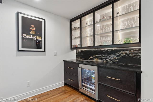 4438 Stony River Dr, Bloomfield Hills, MI 48301 - indoor dry bar with wine cooler and wood finished floors