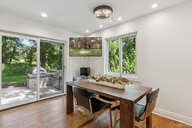 4438 Stony River Dr, Bloomfield Hills, MI 48301 - dining area featuring healthy amount of natural light, wood finished floors, a chandelier, and recessed lighting