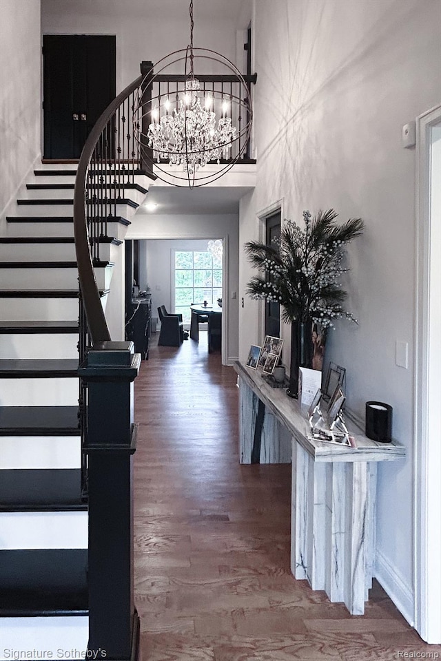 4438 Stony River Dr, Bloomfield Hills, MI 48301 - foyer with stairway, wood finished floors, a chandelier, and a high ceiling