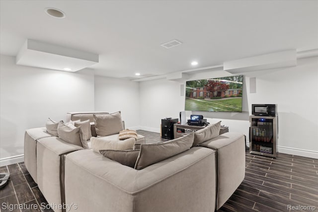4438 Stony River Dr, Bloomfield Hills, MI 48301 - cinema room featuring wood finish floors, wine cooler, and recessed lighting