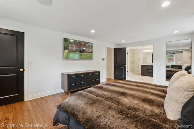 4438 Stony River Dr, Bloomfield Hills, MI 48301 - bedroom with light wood finished floors, recessed lighting, and ensuite bathroom