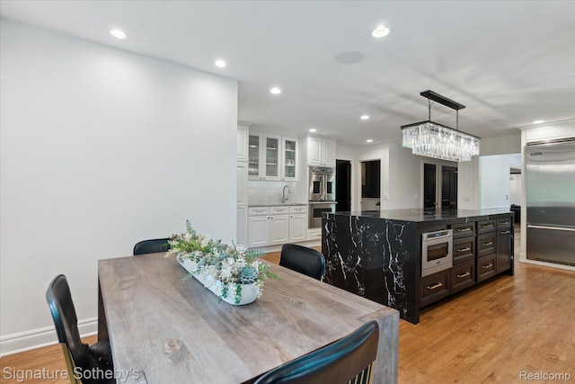 4438 Stony River Dr, Bloomfield Hills, MI 48301 - dining room featuring recessed lighting and light wood finished floors