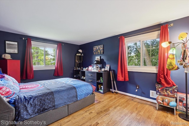 4438 Stony River Dr, Bloomfield Hills, MI 48301 - bedroom featuring wood finished floors and baseboards