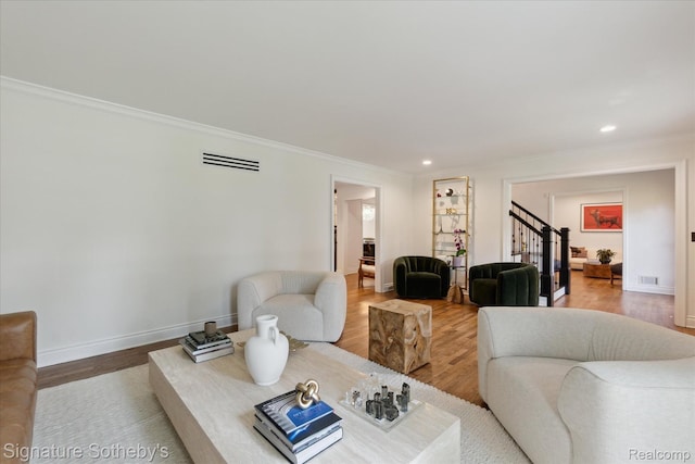 4438 Stony River Dr, Bloomfield Hills, MI 48301 - living area featuring ornamental molding, wood finished floors, stairway, and recessed lighting