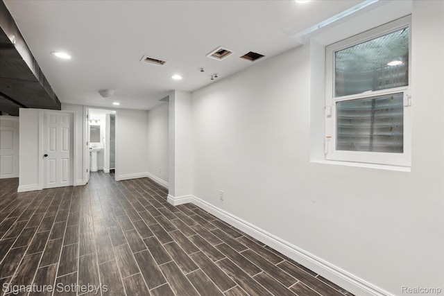 4438 Stony River Dr, Bloomfield Hills, MI 48301 - finished below grade area featuring dark wood-type flooring and recessed lighting