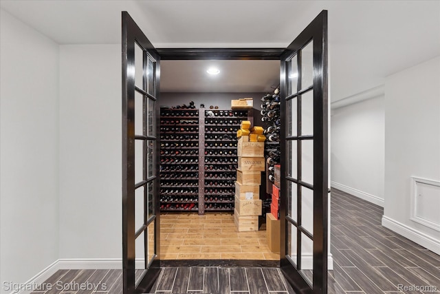4438 Stony River Dr, Bloomfield Hills, MI 48301 - wine cellar featuring wood tiled floors and recessed lighting