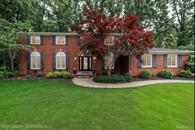 4438 Stony River Dr, Bloomfield Hills, MI 48301 - colonial home featuring a front yard and brick siding