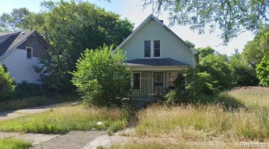 107 Sturtevant St, Highland Park, MI 48203 - view of front of home with a porch