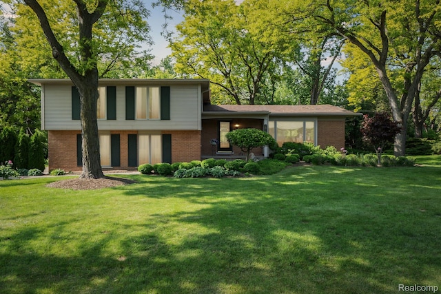 2650 Binbrooke Dr, Troy, MI 48084 - tri-level home with brick siding and a front yard