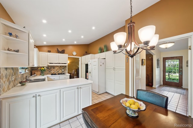 2650 Binbrooke Dr, Troy, MI 48084 - dining room featuring vaulted ceiling, a chandelier, light tile patterned floors, and recessed lighting