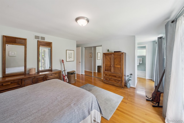 2650 Binbrooke Dr, Troy, MI 48084 - bedroom with light wood finished floors and baseboards