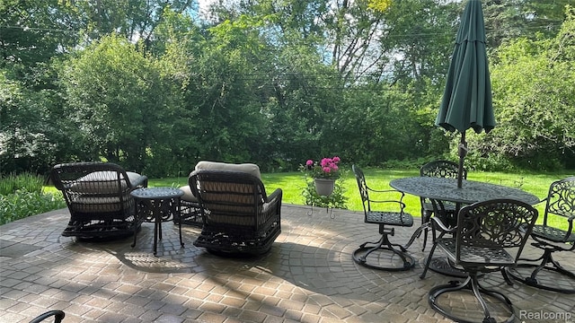 2650 Binbrooke Dr, Troy, MI 48084 - view of patio with view of scattered trees and outdoor dining space