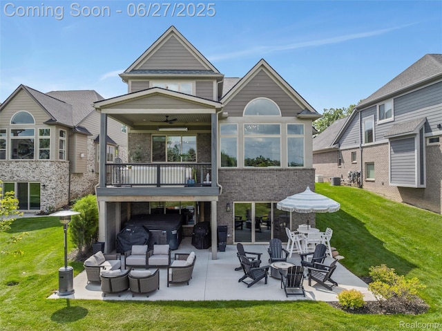 8264 Stoney Creek Dr, South Lyon, MI 48178 - back of property featuring a patio area, a yard, an outdoor living space, and brick siding