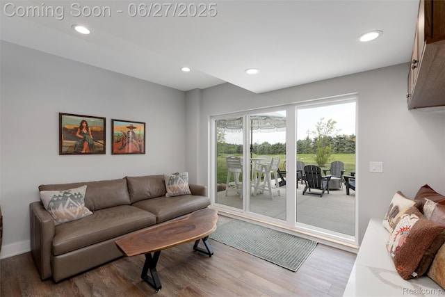 8264 Stoney Creek Dr, South Lyon, MI 48178 - living area featuring wood finished floors and recessed lighting