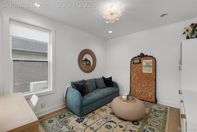 8264 Stoney Creek Dr, South Lyon, MI 48178 - living room featuring wood finished floors and recessed lighting