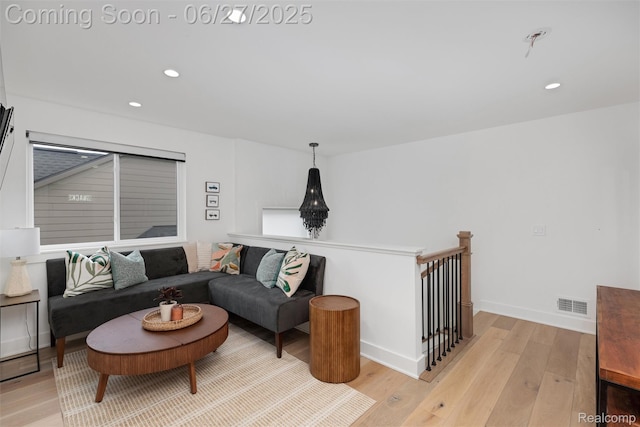 8264 Stoney Creek Dr, South Lyon, MI 48178 - living area featuring light wood-type flooring and recessed lighting