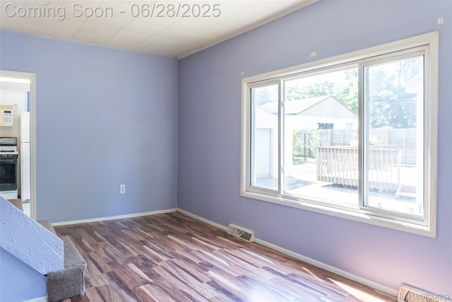 21312 Saint Francis St, Farmington Hills, MI 48336 - unfurnished room featuring wood finished floors and baseboards