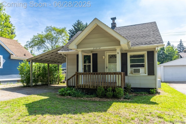 21312 Saint Francis St, Farmington Hills, MI 48336 - bungalow-style home with covered porch, a front lawn, a shingled roof, and an outbuilding