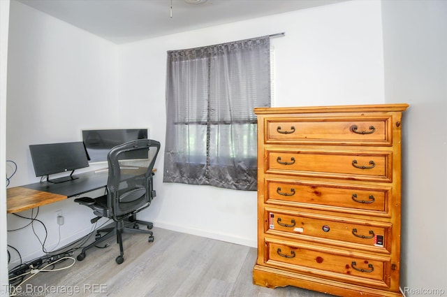 8021 Benson Rd, Mount Morris, MI 48458 - office area with wood finished floors and baseboards
