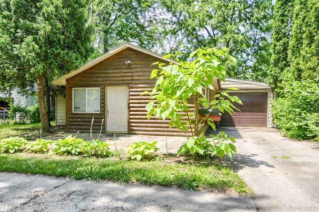 8021 Benson Rd, Mount Morris, MI 48458 - view of front facade with driveway and an attached garage