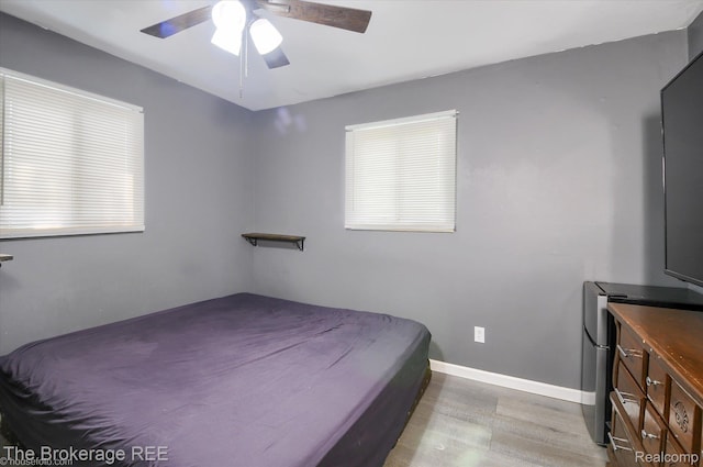 8021 Benson Rd, Mount Morris, MI 48458 - bedroom with light wood-type flooring and ceiling fan