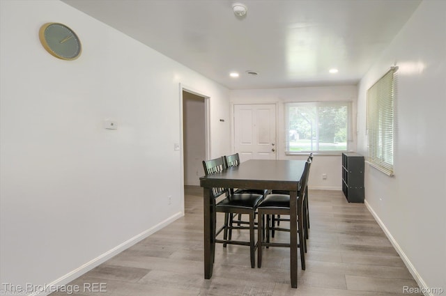 8021 Benson Rd, Mount Morris, MI 48458 - dining room featuring light wood-type flooring and recessed lighting