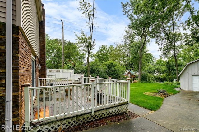 21462 Meridian Rd, Grosse Ile, MI 48138 - wooden deck with a yard, an outbuilding, view of scattered trees, and a detached garage