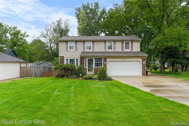21462 Meridian Rd, Grosse Ile, MI 48138 - traditional-style home with driveway, an attached garage, brick siding, and a chimney
