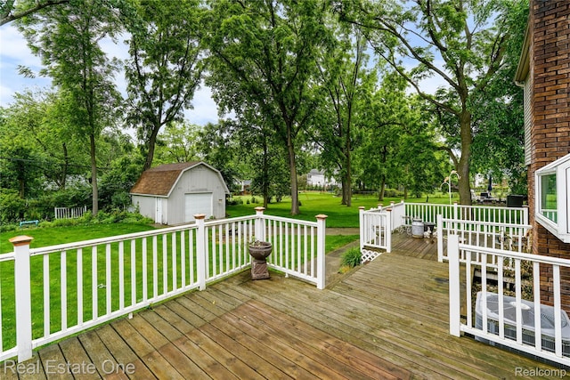 21462 Meridian Rd, Grosse Ile, MI 48138 - wooden terrace with an outbuilding, a lawn, a detached garage, and view of scattered trees
