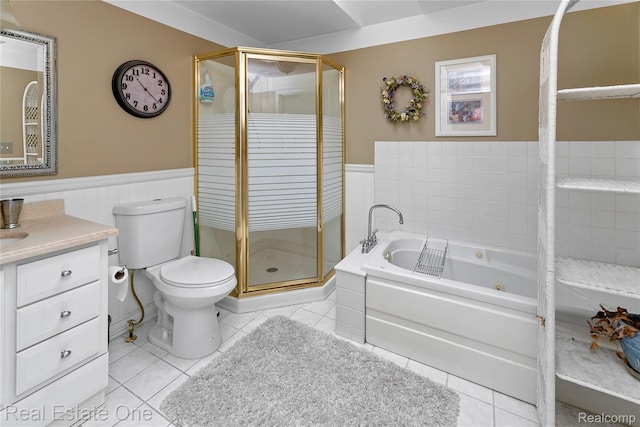 21462 Meridian Rd, Grosse Ile, MI 48138 - full bath featuring vanity, a jetted tub, wainscoting, a stall shower, and tile patterned flooring