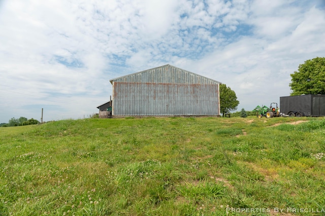 21491 8th Ave, Conklin, MI 49403 - view of yard with an outbuilding and a detached garage