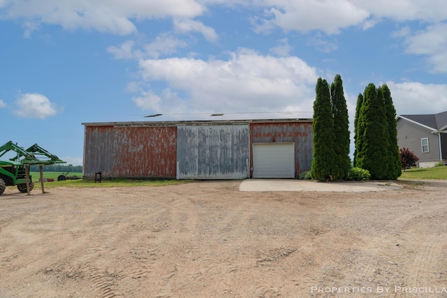 21491 8th Ave, Conklin, MI 49403 - view of pole building with driveway