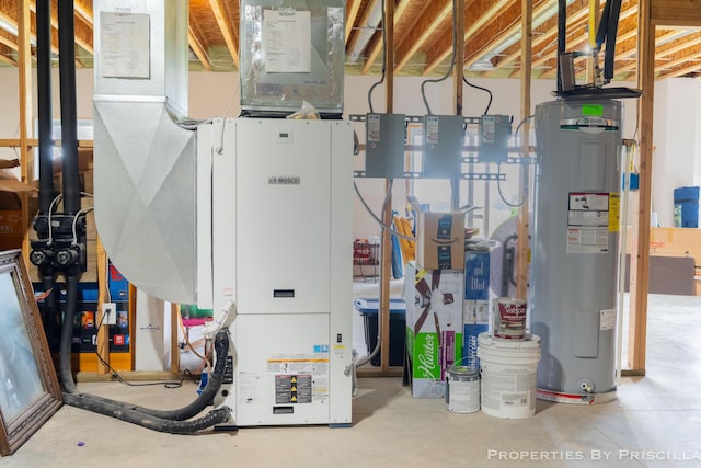 21491 8th Ave, Conklin, MI 49403 - utility room featuring water heater
