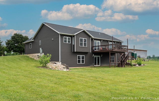 21491 8th Ave, Conklin, MI 49403 - back of property with a deck, a lawn, and stairs