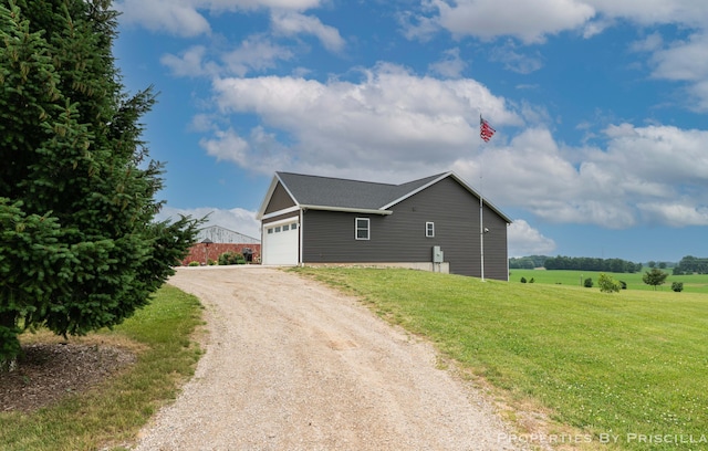 21491 8th Ave, Conklin, MI 49403 - view of side of home featuring dirt driveway and a yard