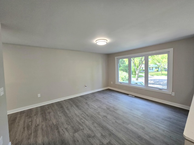 2159 E Eden Ct, Ann Arbor, MI 48108 - unfurnished room with dark wood-style flooring and baseboards
