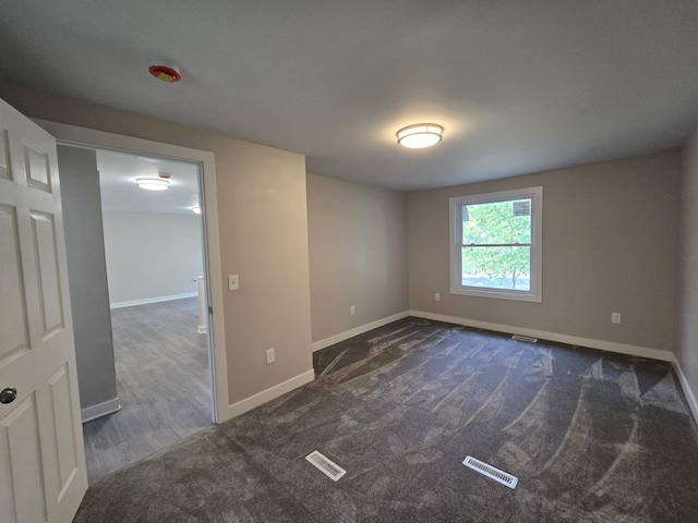 2159 E Eden Ct, Ann Arbor, MI 48108 - unfurnished room with baseboards and carpet floors