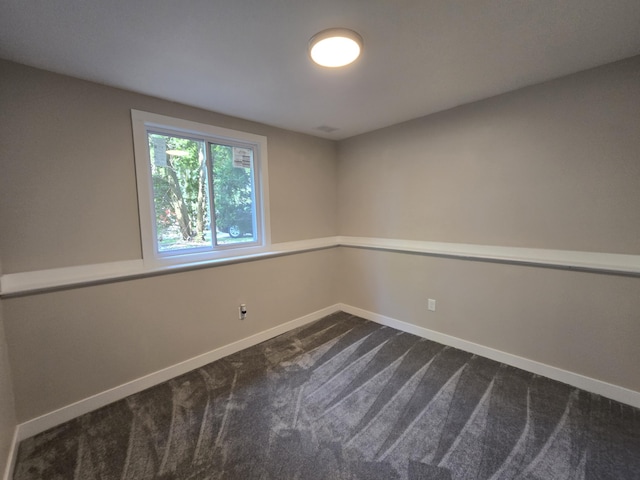 2159 E Eden Ct, Ann Arbor, MI 48108 - unfurnished room featuring dark colored carpet and baseboards