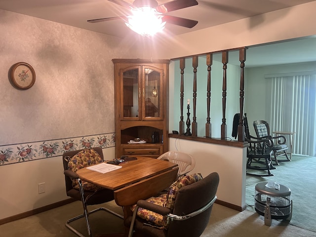 5804 Leisure S Dr SE, Grand Rapids, MI 49548 - carpeted dining room featuring a ceiling fan and baseboards