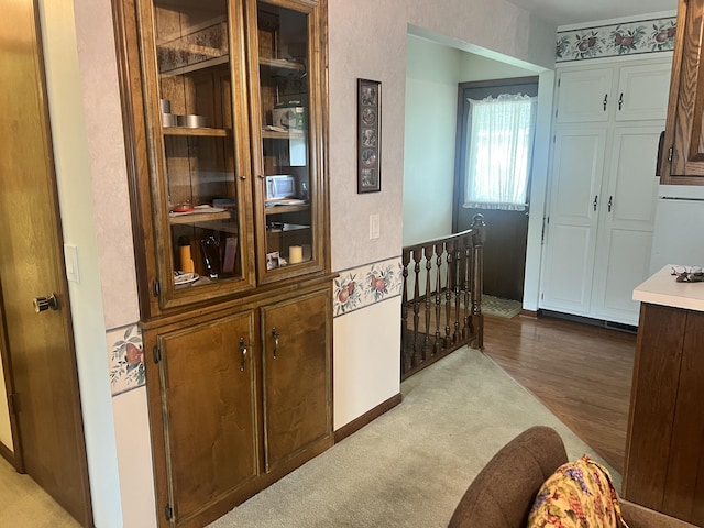 5804 Leisure S Dr SE, Grand Rapids, MI 49548 - corridor with an upstairs landing and wood finished floors