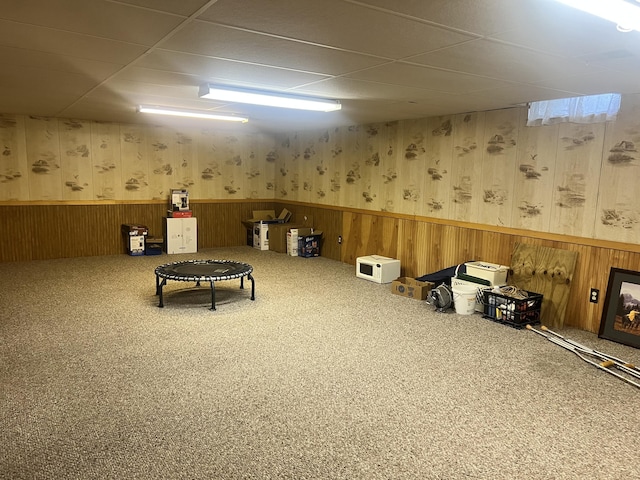 5804 Leisure S Dr SE, Grand Rapids, MI 49548 - finished below grade area featuring wainscoting, a drop ceiling, wallpapered walls, and carpet