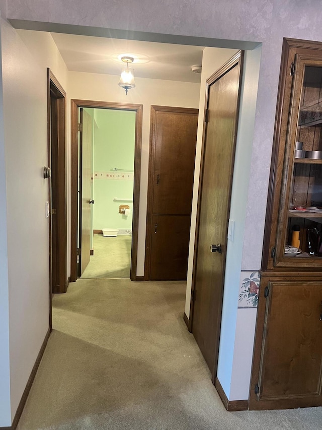 5804 Leisure S Dr SE, Grand Rapids, MI 49548 - hall featuring light colored carpet and baseboards